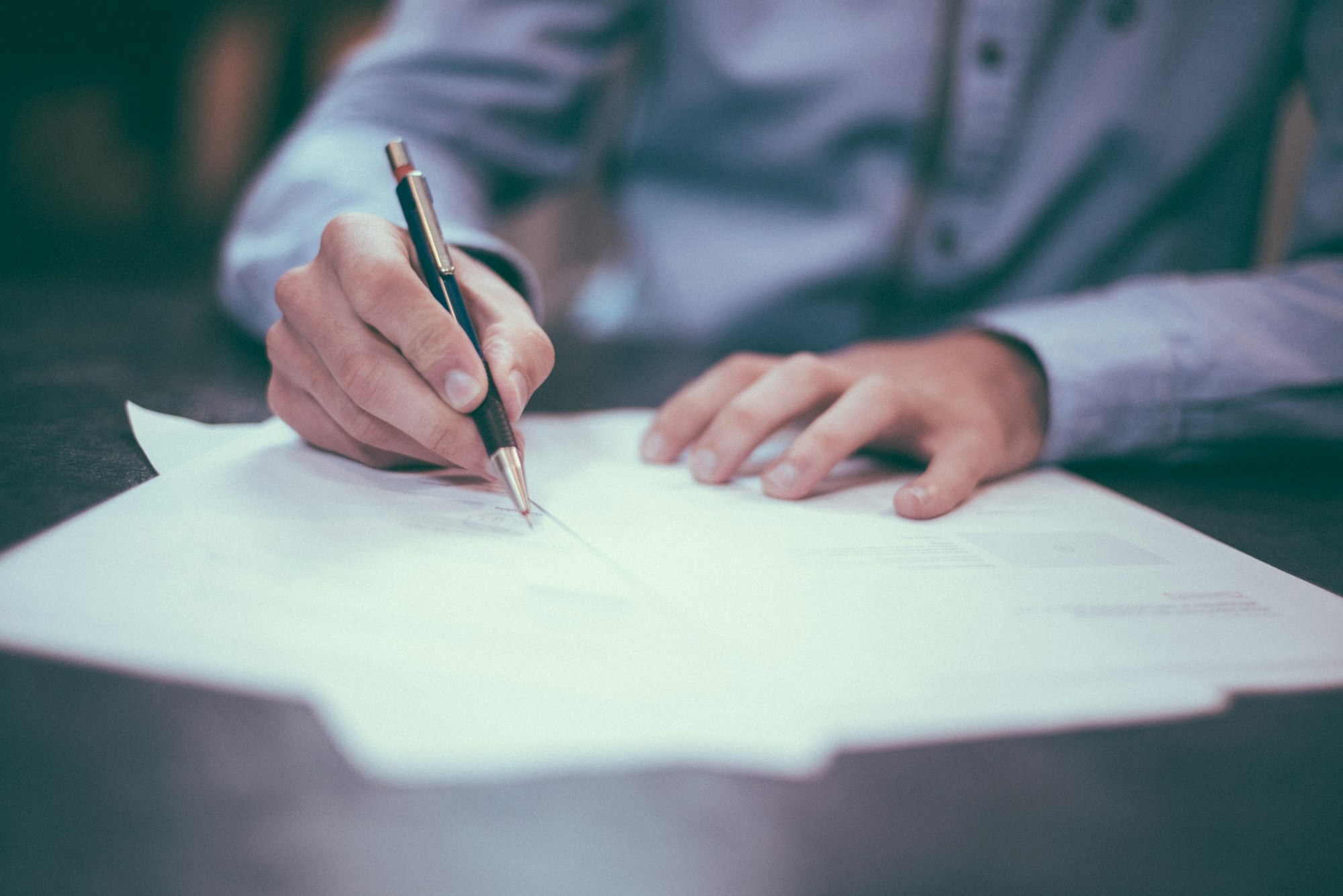 Consultant reviewing a project plan and proposal